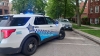 A police car is seen outside the Albany Park apartment in Chicago, Illinois, of Elias Rodriquez